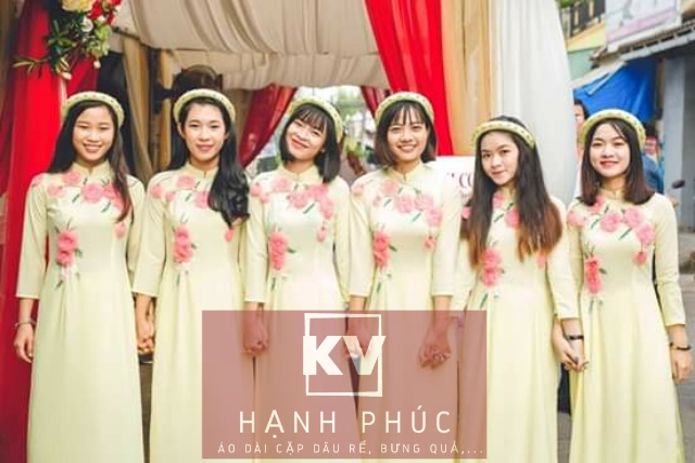 ÁO DÀI VÀNG CHANH HOA HỒNG
